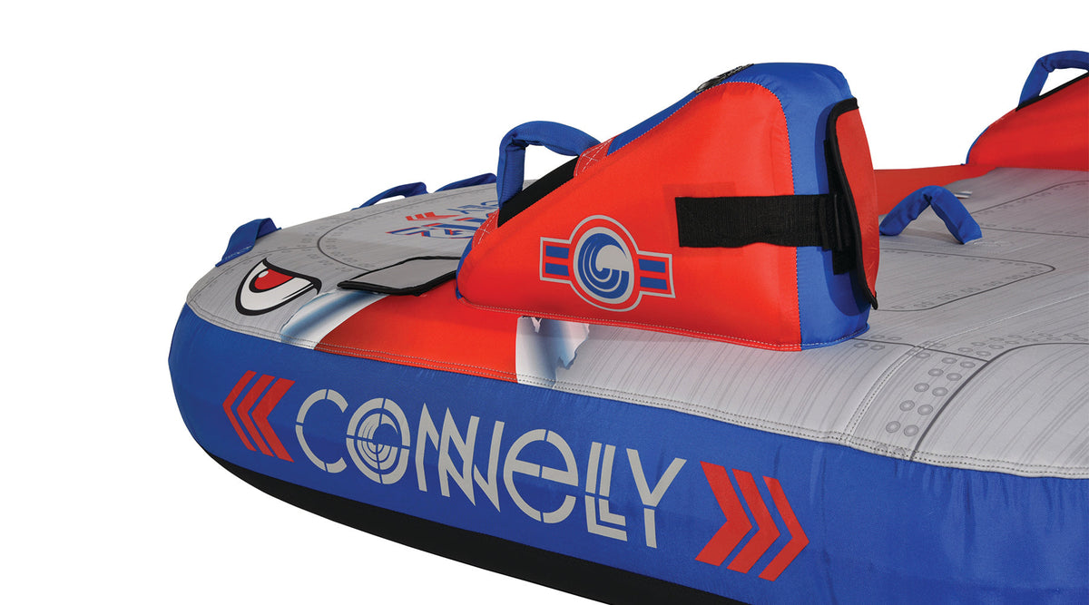 Detail view of Switch 2 logo and handle grips on red and gray surface.