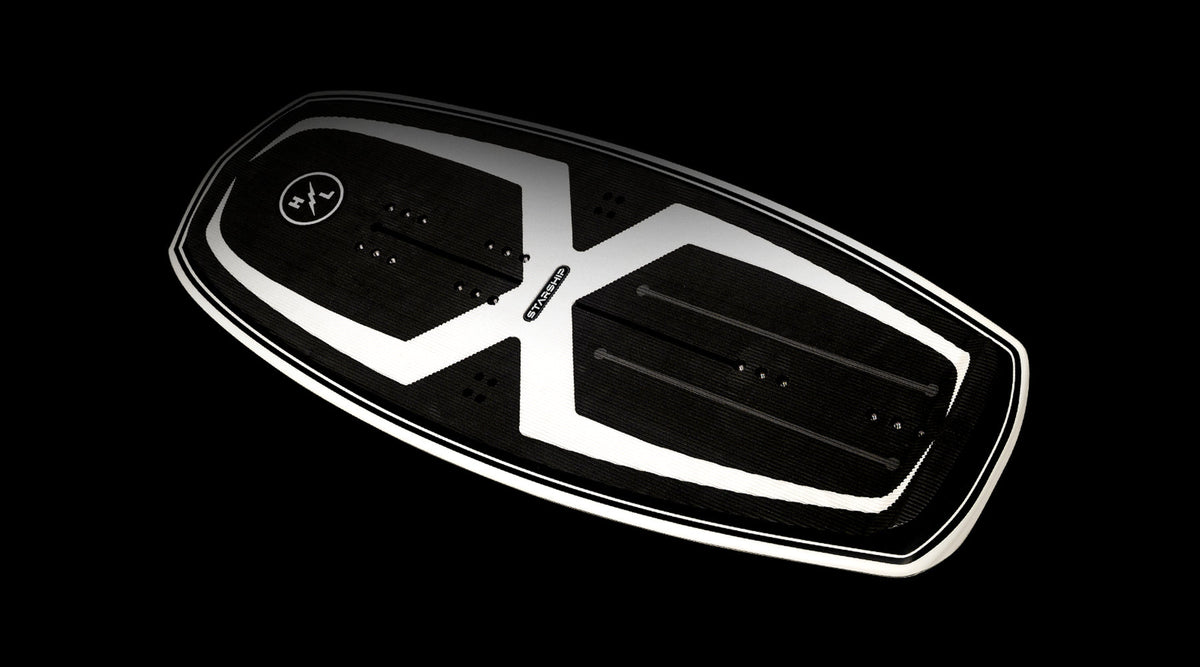 Futuristic black and white hoverboard reminiscent of a Starship 3.4.