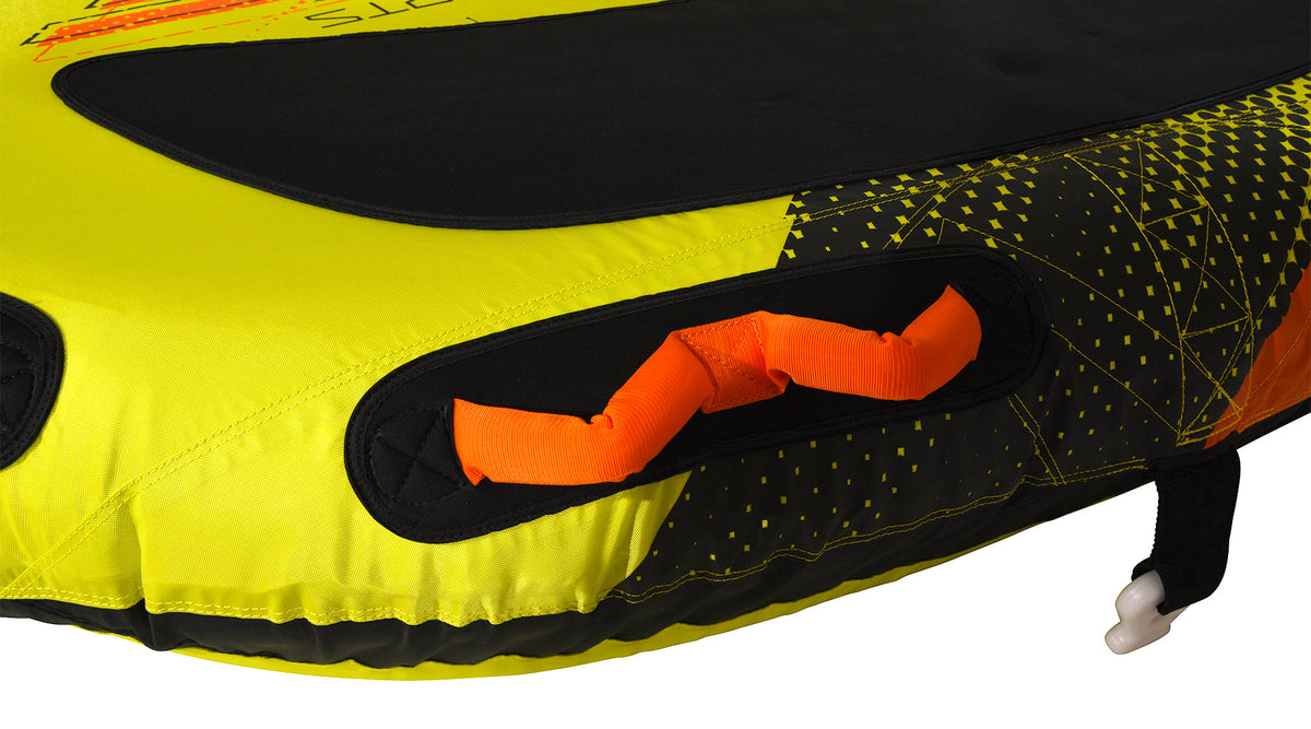 Detail view of Glide 3 Tube orange grab handle on black and yellow panel.