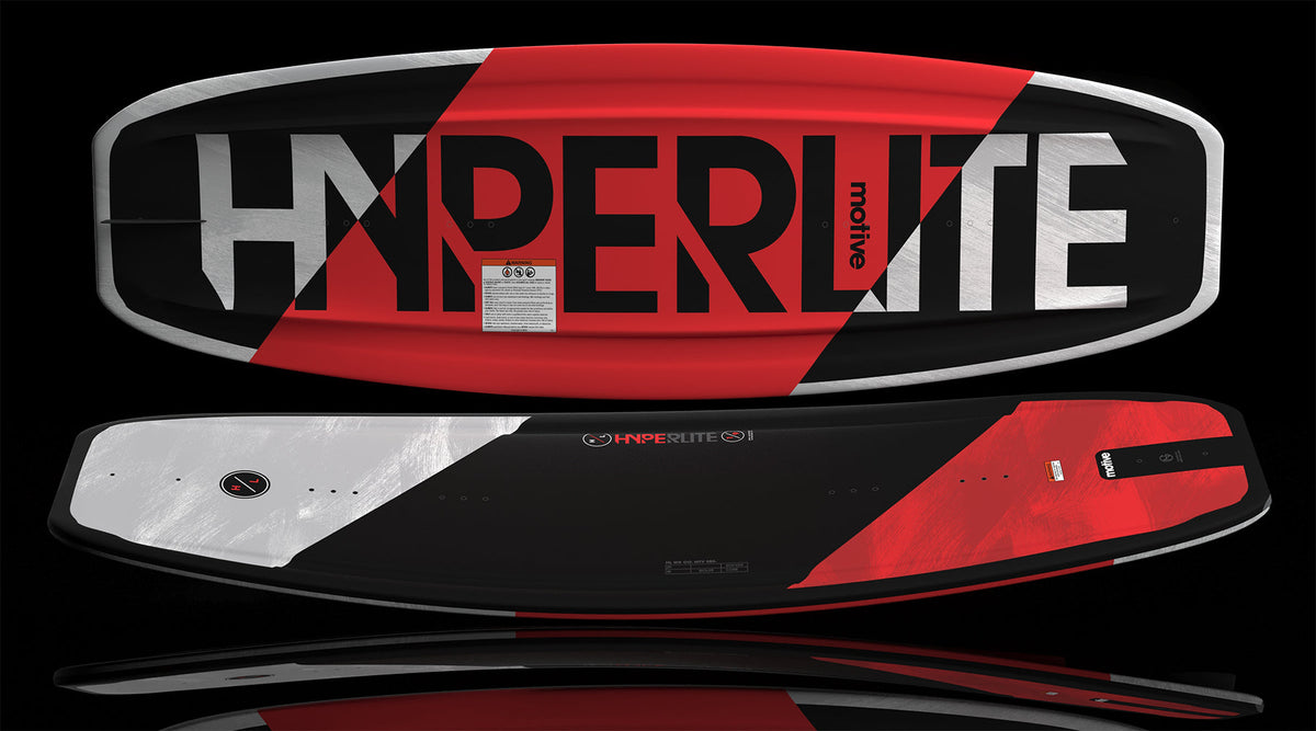 Base and top view of Motive Jr. wakeboard with bold red, black, and white pattern.