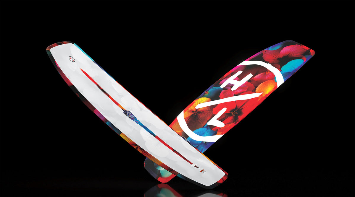 Angled split view of Murray Jr. Girls wakeboard showing white top and floral base.