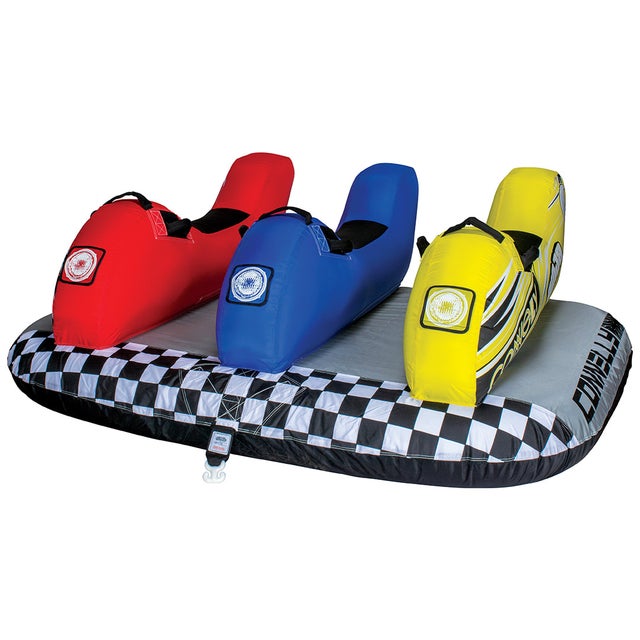 Angled view of the Ninja 3 towable tube with three motorcycle-style seats in red, blue, and yellow on a checkered base.