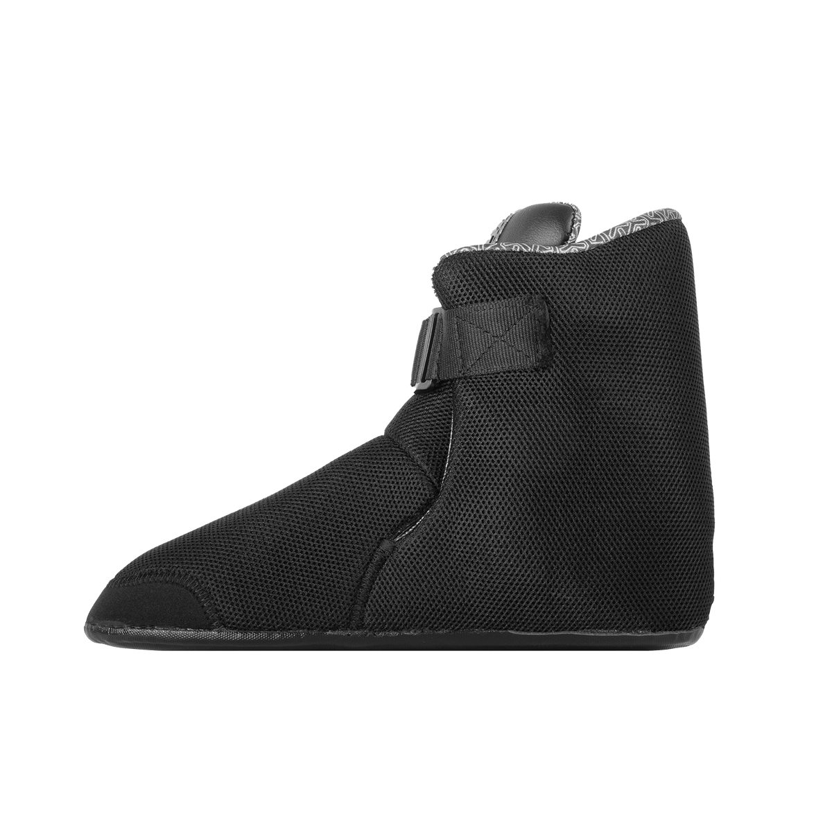Side view of the Syndicate Hardshell Liner, featuring the streamlined black design and sturdy sole construction.